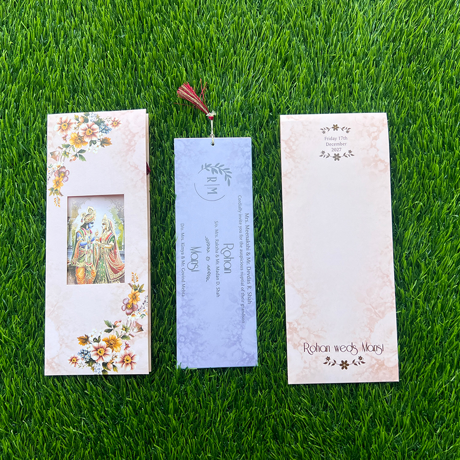Celebrate the beauty of love and devotion with Radha Krishna Theme Wedding Cards by Metro Cards. Inspired by the eternal bond of Radha and Krishna, these invitations bring a spiritual, romantic and traditional touch to your wedding announcement. Our collection may feature Radha Krishna illustrations, Krishna's flute, peacock feathers, lotus motifs, traditional artwork and elegant devotional designs. Choose from rich royal colours, soft pastel shades, classic Indian styles and premium invitation formats. Depending on the design, customization options may include foil printing, embossing, laser-cut details, velvet finishes, acrylic elements and coordinated inserts. For families looking for meaningful and artistic wedding invitations, Radha Krishna theme cards beautifully combine Indian tradition with the celebration of love. Explore Radha Krishna Theme Wedding Cards in Ahmedabad at Metro Cards.